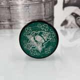 Autographed Penguins St. Patrick's Day Puck (Black Puck), Various Players