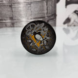 Autographed Penguins Her Hockey Puck, Various Players