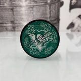 Autographed Penguins St. Patrick's Day Puck (Black Puck), Various Players