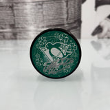 Autographed Penguins St. Patrick's Day Puck (Black Puck), Various Players